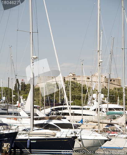 Image of yachts harbor of Antibes France on the French Riviera with castl