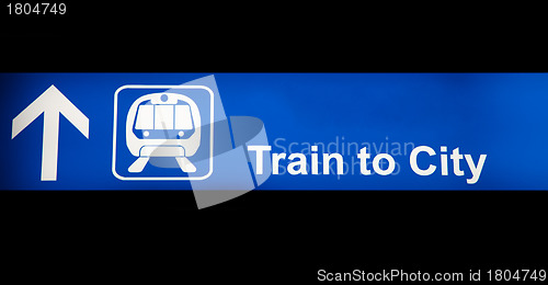 Image of Train to city blue sign