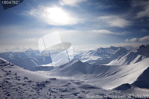 Image of Snowy mountains in evening