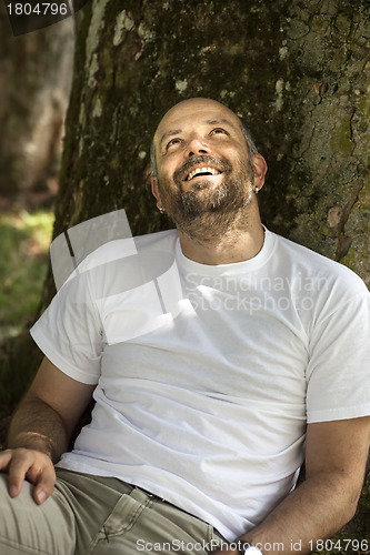 Image of man with beard relaxing