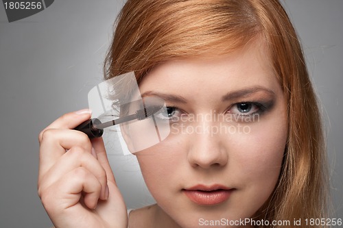 Image of Girl does a make-up