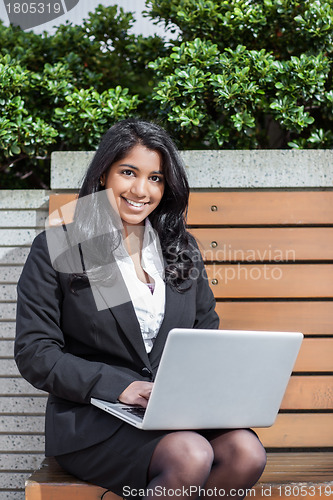 Image of Indian businesswoman with laptop