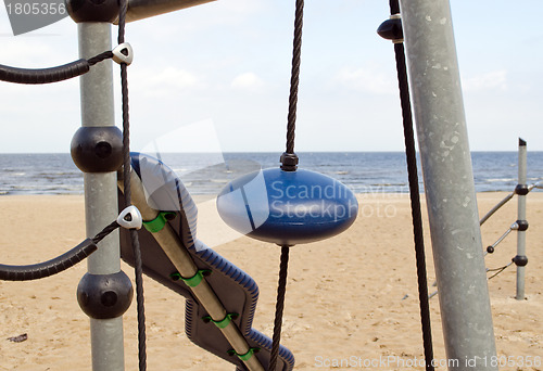 Image of Kid playground near sea. Climbing equipment 