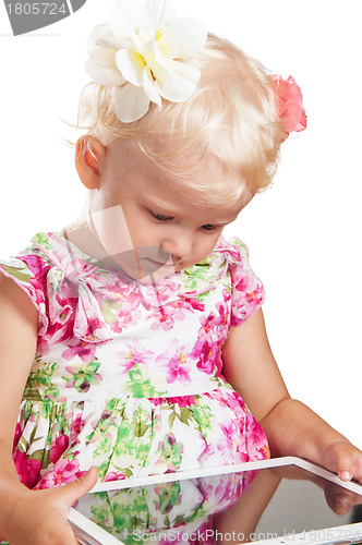 Image of Portrait of a young girl and tablet, isolated on white