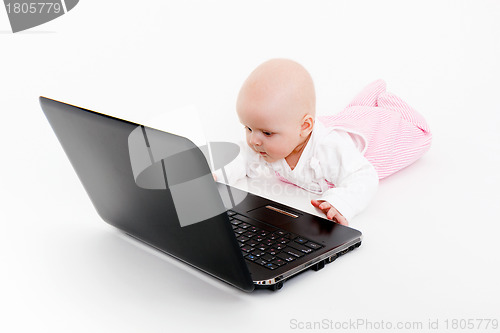 Image of baby with laptop