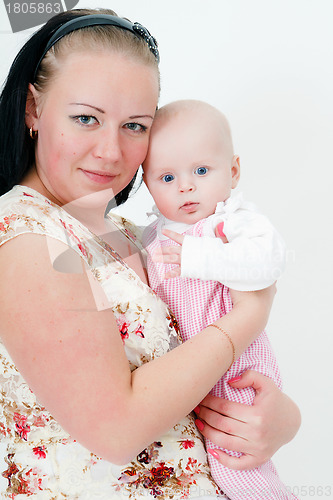 Image of young woman with a baby