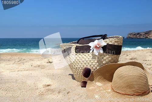 Image of Seacoast, straw beach bag, hat and sunglasses 