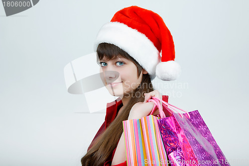 Image of A girl in a Christmas hat