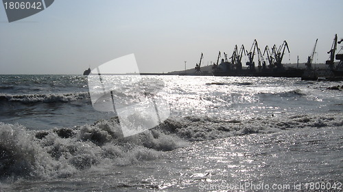 Image of panorama of the everning sea with docks