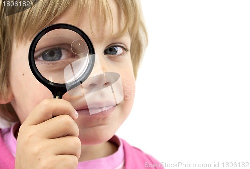 Image of Girl with magnifying glass