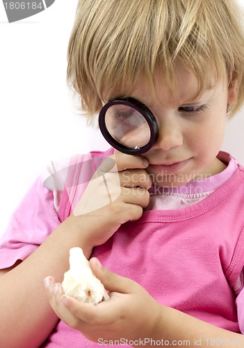 Image of Girl with magnifying glass