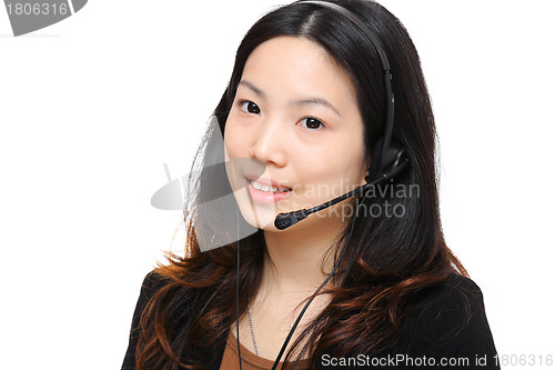 Image of young asian business woman with headset