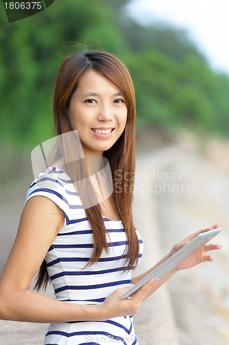 Image of woman using tablet computer