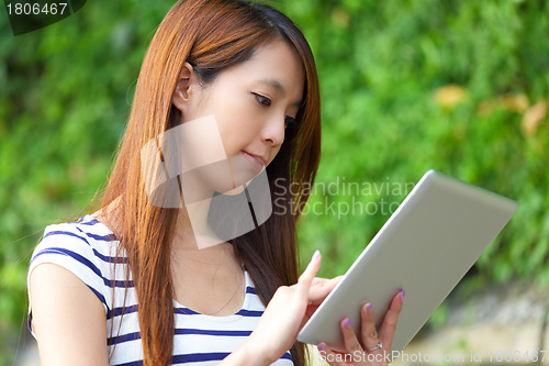 Image of woman using tablet computer