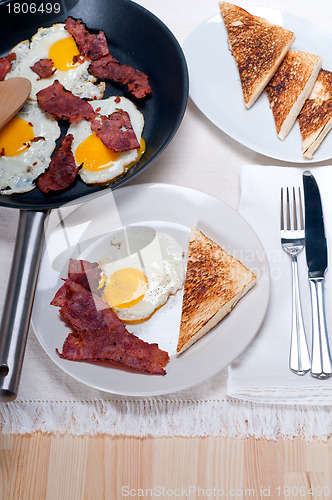 Image of eggs bacon and toast bread