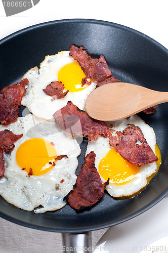 Image of eggs bacon and toast bread