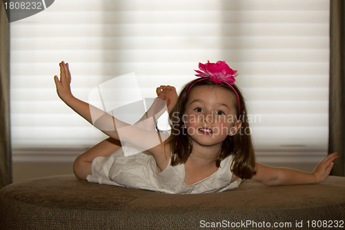 Image of Playful, happy child posing.