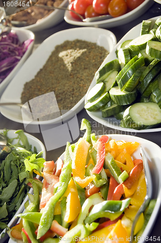 Image of sliced vegetables tomatoes with spice Jerusalem