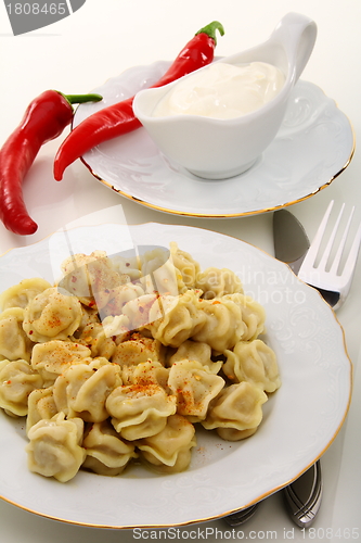 Image of Meat dumplings with chili. 