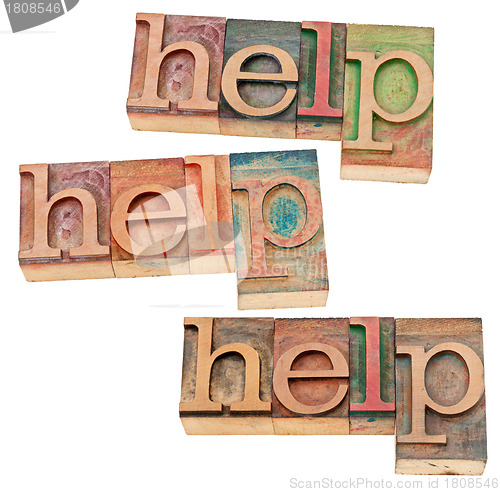 Image of help concept in wood type