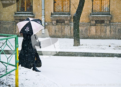 Image of Woman with umbrella