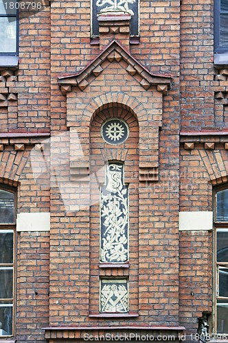 Image of Ornamented Brick Facade of Old Building