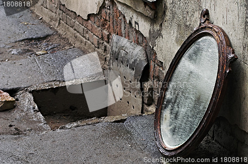 Image of Thrown Out Old Mirror