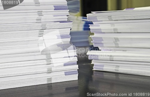 Image of Piles of Handout Pamphlets