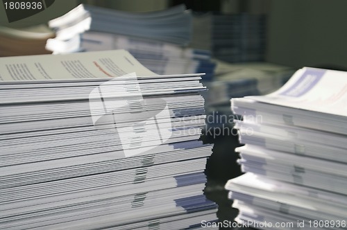 Image of Piles of Handout Pamphlets