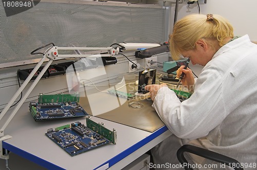 Image of Engineer working with circuits