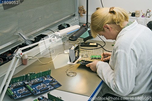 Image of Engineer working with circuits 