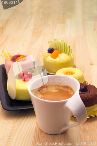 Image of espresso coffee and  fruit cake