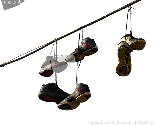 Image of Sneakers Hanging on a Telephone Line