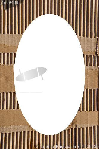 Image of Packing box wall and white oval in center 