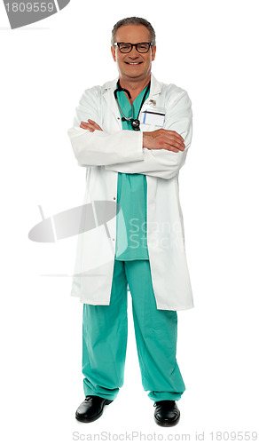 Image of Medical expert standing with arms crossed