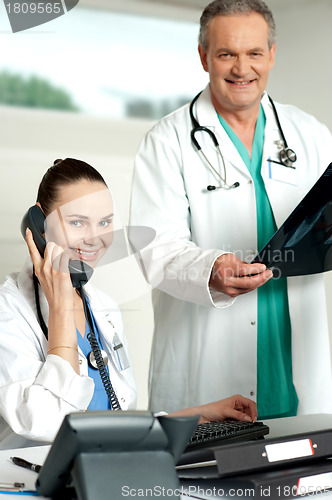 Image of Two experienced medical representatives posing