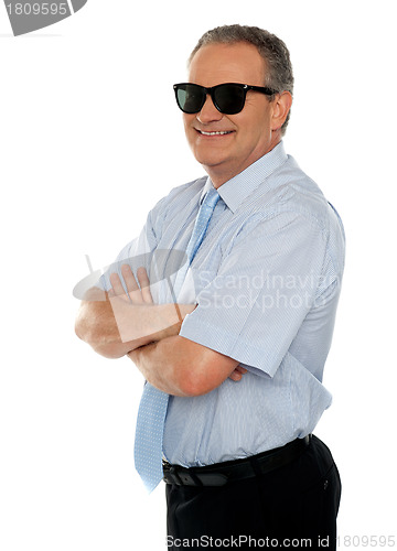 Image of Confident male executive wearing sunglasses