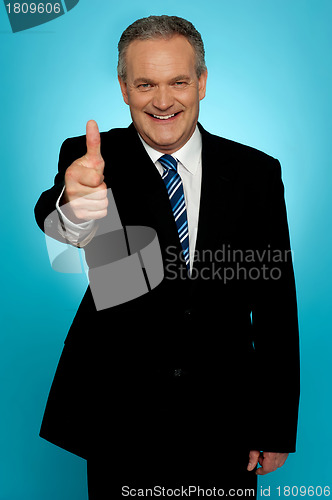 Image of Corporate man showing thumbs up