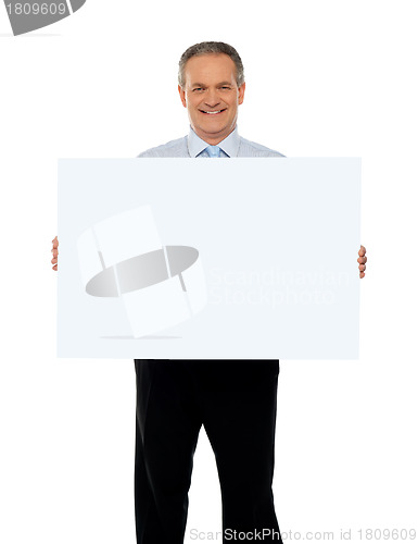 Image of Experienced male representative with ad board