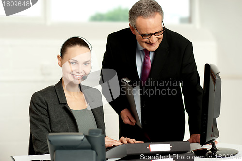 Image of Team of two business executives working in office