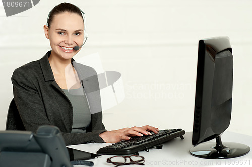 Image of Female employee assisting customers