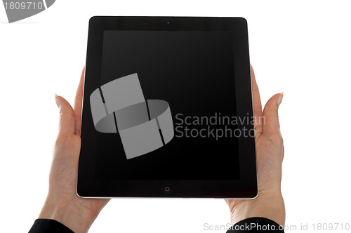 Image of Female hands showing touch screen device