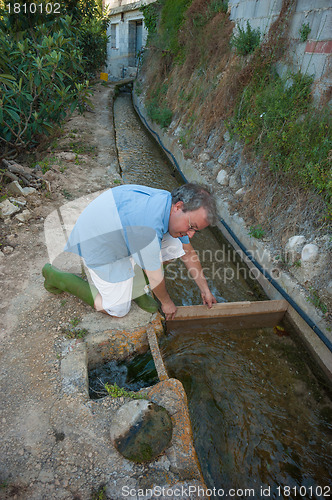 Image of Getting water