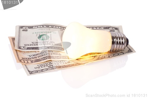 Image of bulb on dollars