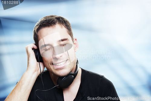 Image of man listening the music