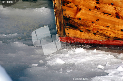 Image of Wooden boat in ice