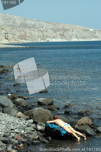 Image of woman sunbathing