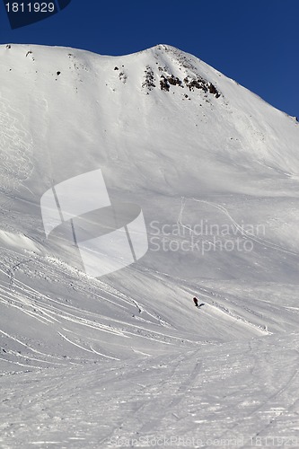 Image of Skiers on ski piste