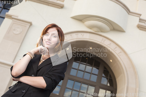 Image of Young Pretty Businesswoman Outside in Front of City Hall