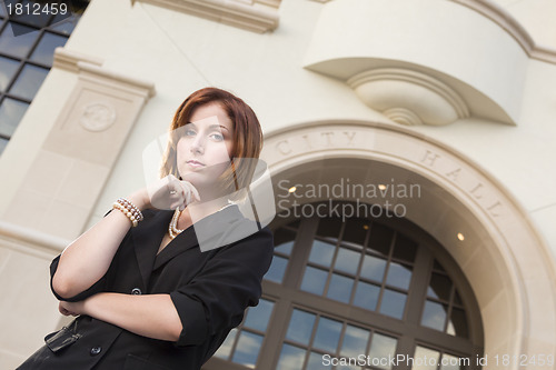 Image of Young Pretty Businesswoman Outside in Front of City Hall